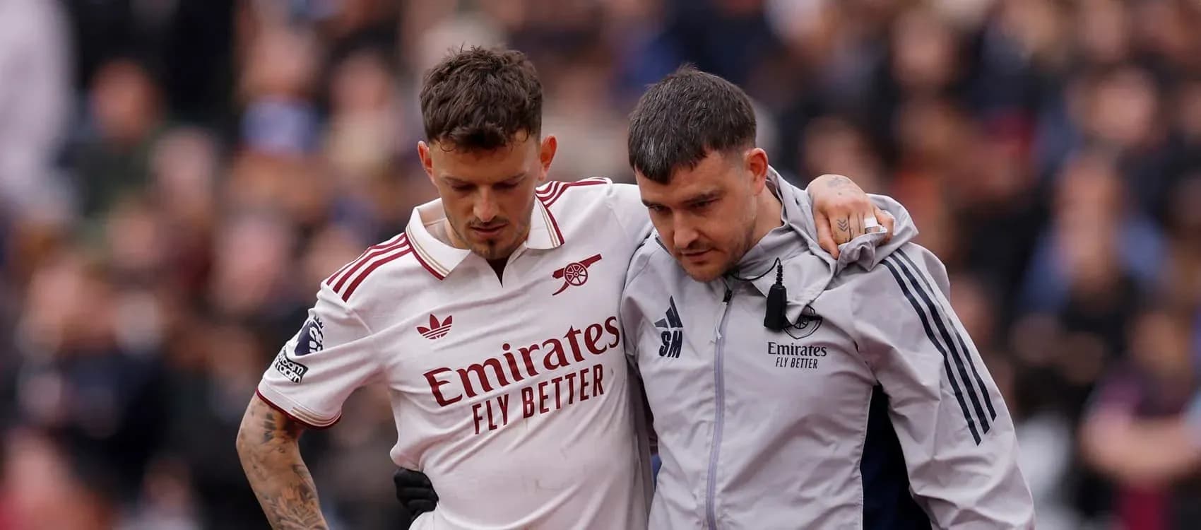 Player assisted off the field after injury