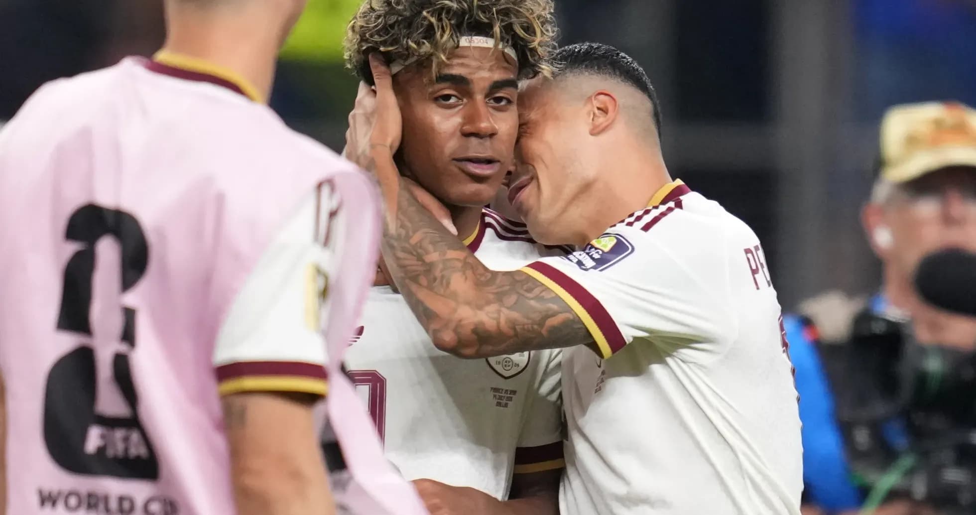 Two players celebrating during Spain vs Argentina match