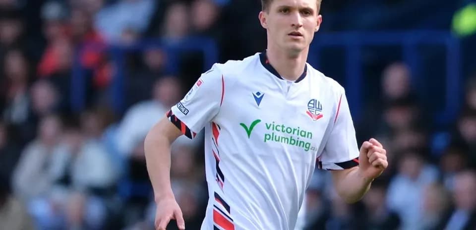 Bolton Wanderers player running during a match