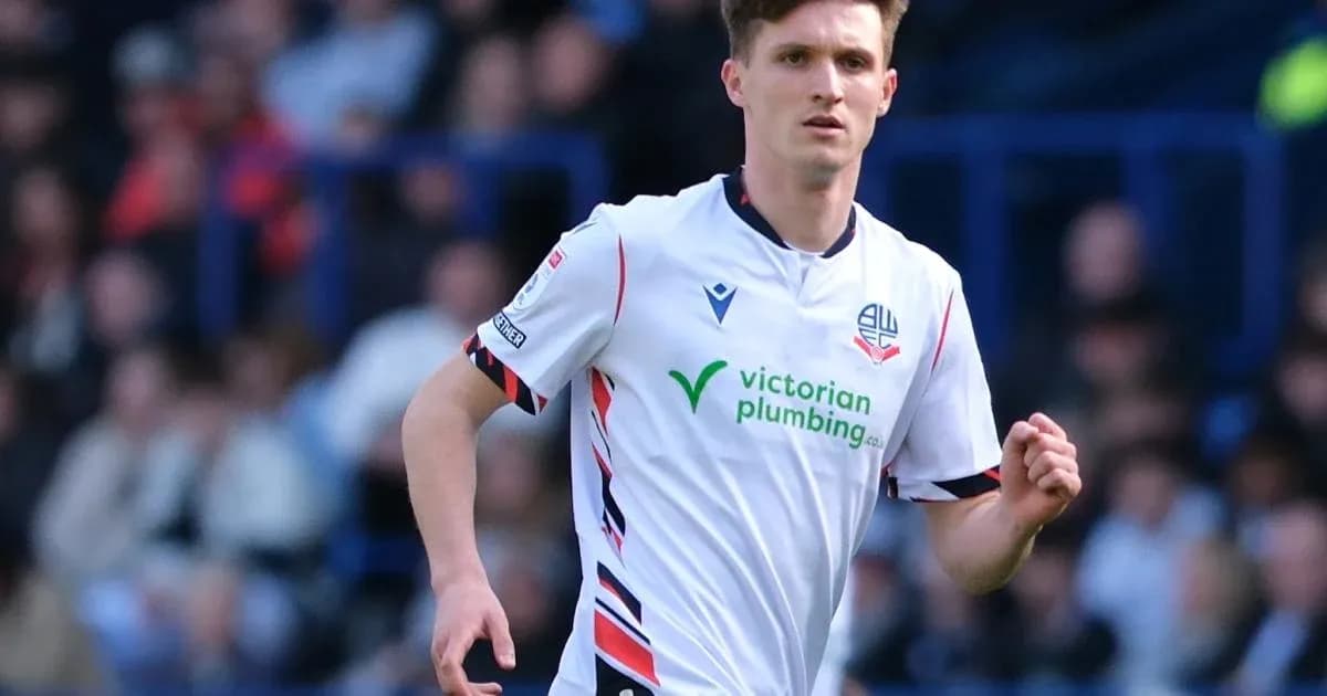 Bolton Wanderers player running during a match