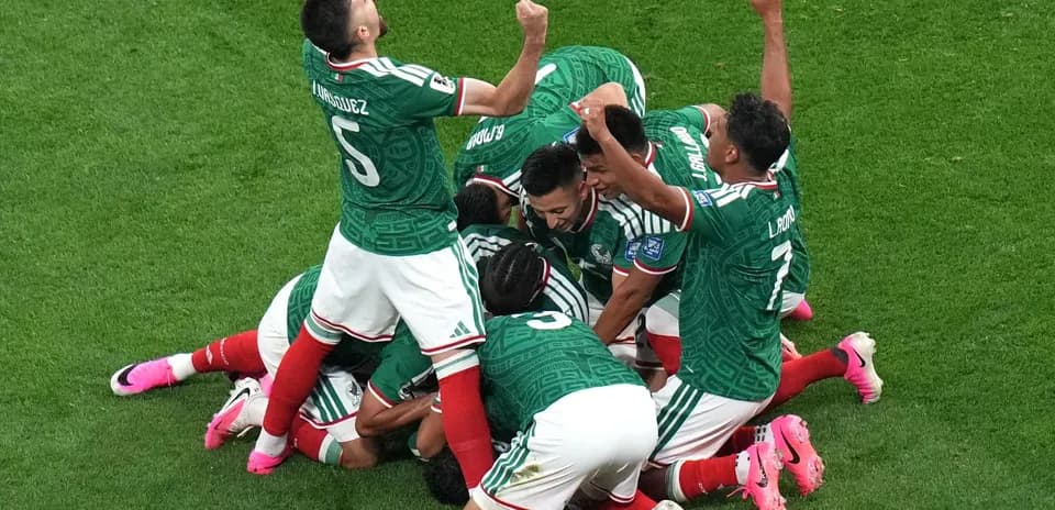 Mexico players celebrating a goal in match