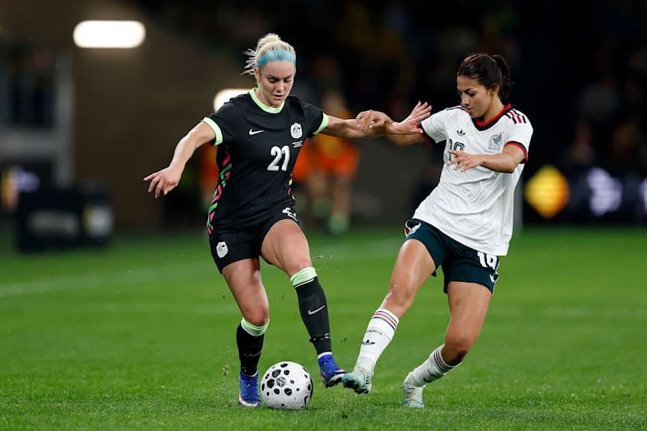 Two players contesting for the ball during match