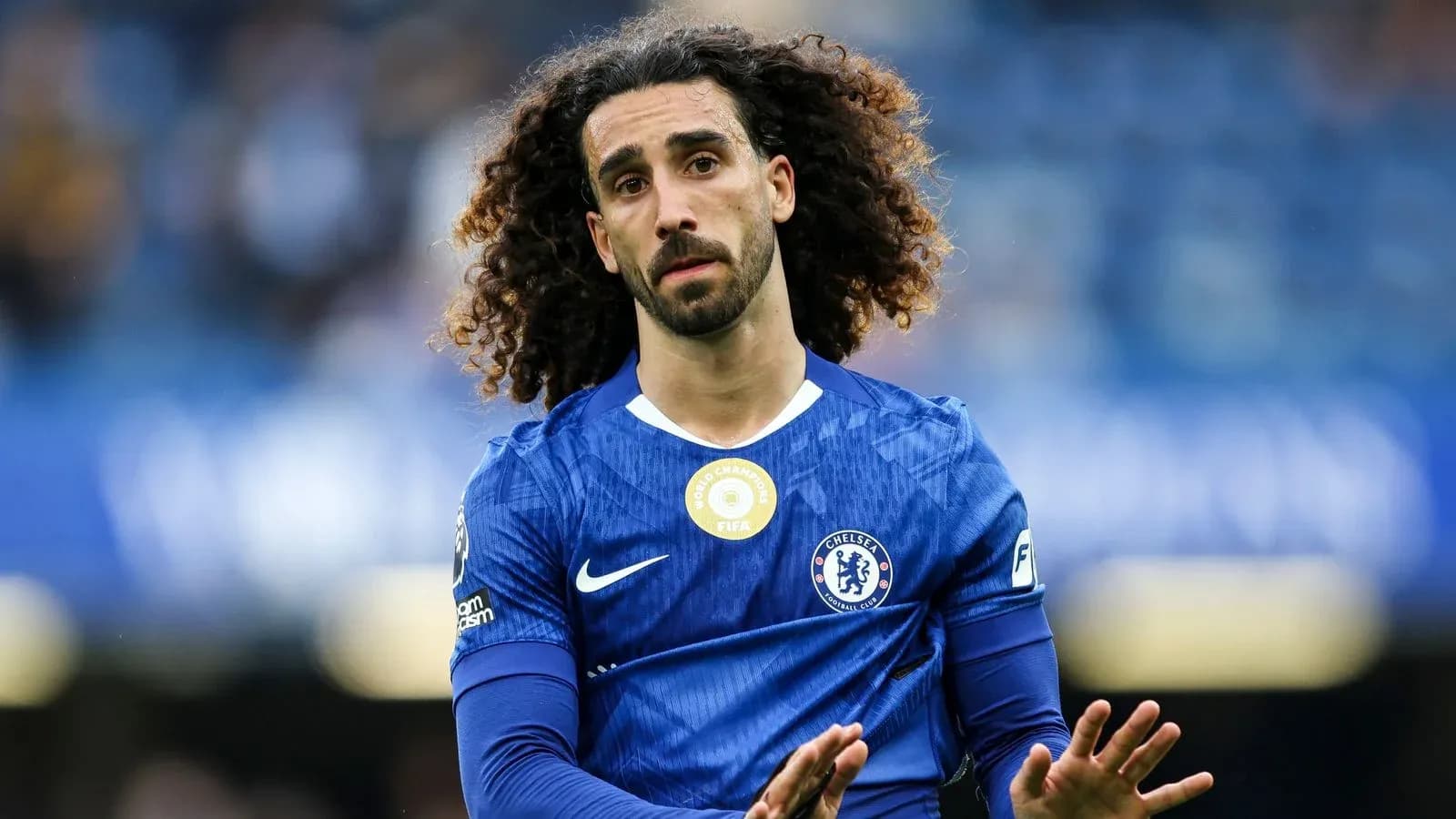 Player in blue Chelsea jersey on the pitch