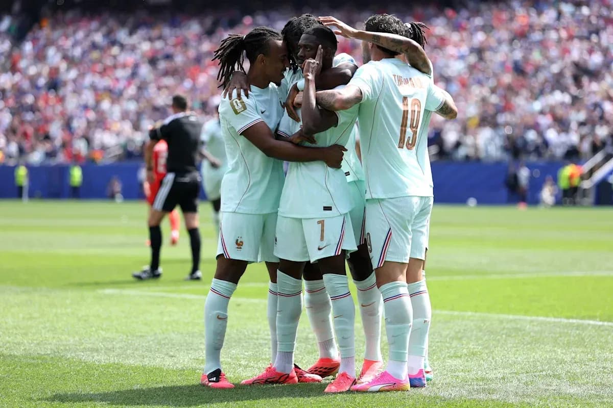 French players celebrating a goal on the field