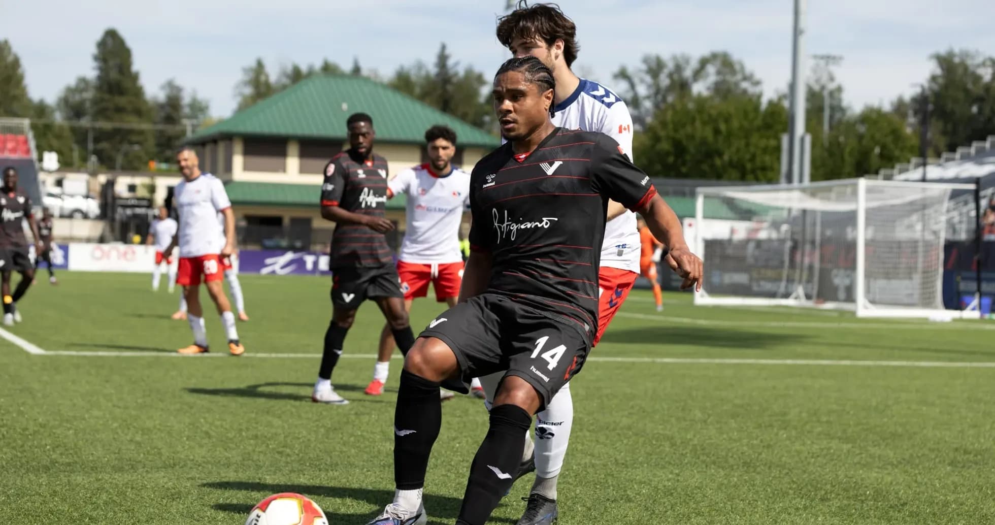 Player dribbling the ball during Vancouver FC match