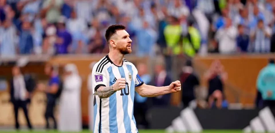 Lionel Messi celebrating in Argentina jersey during match