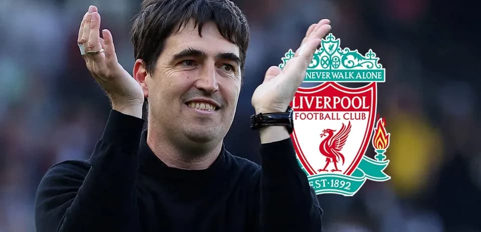 Coach celebrating with Liverpool FC logo in background