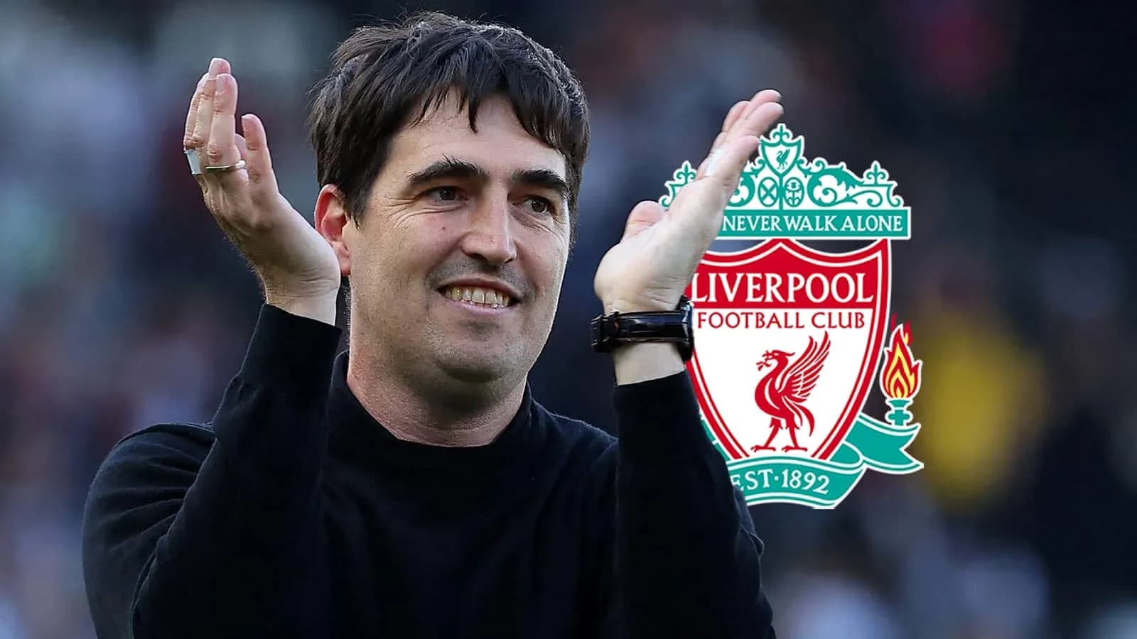Coach celebrating with Liverpool FC logo in background