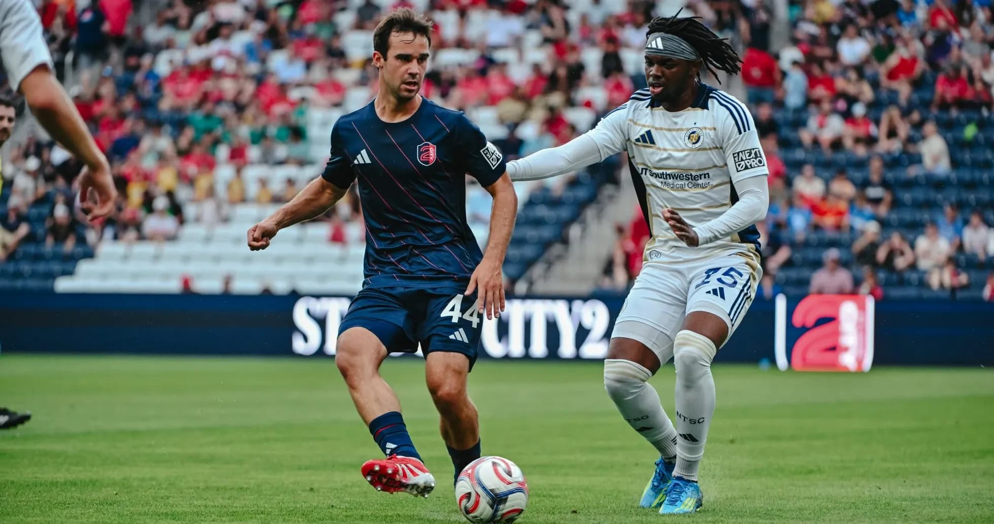 Player dribbling the ball during St. Louis City II match