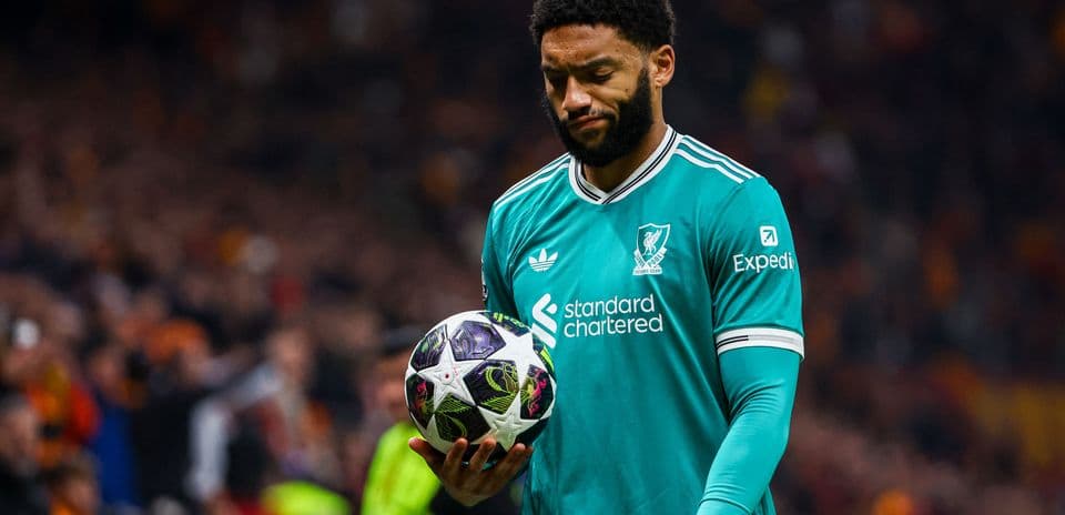 Player holding ball during match with focused expression