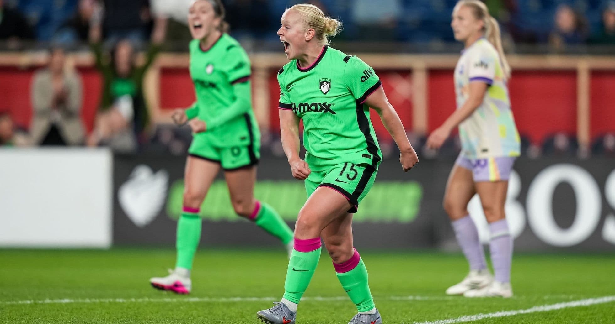 Player celebrating a goal during NWSL match