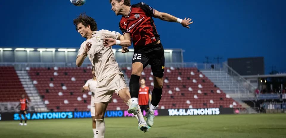 Players contesting for the ball during FC Tulsa match