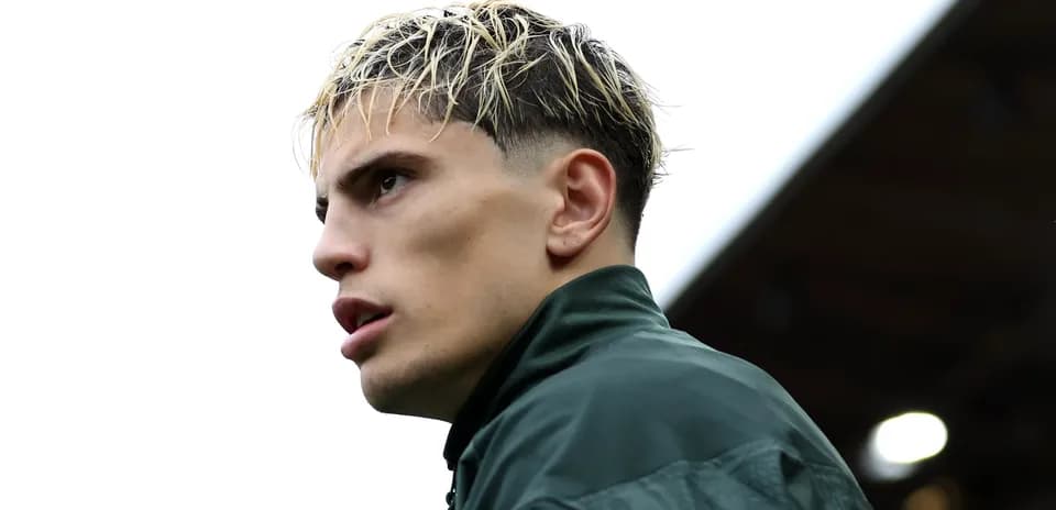 Player in training gear looking off into distance