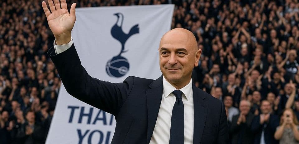 Man waving at Tottenham fans in stadium