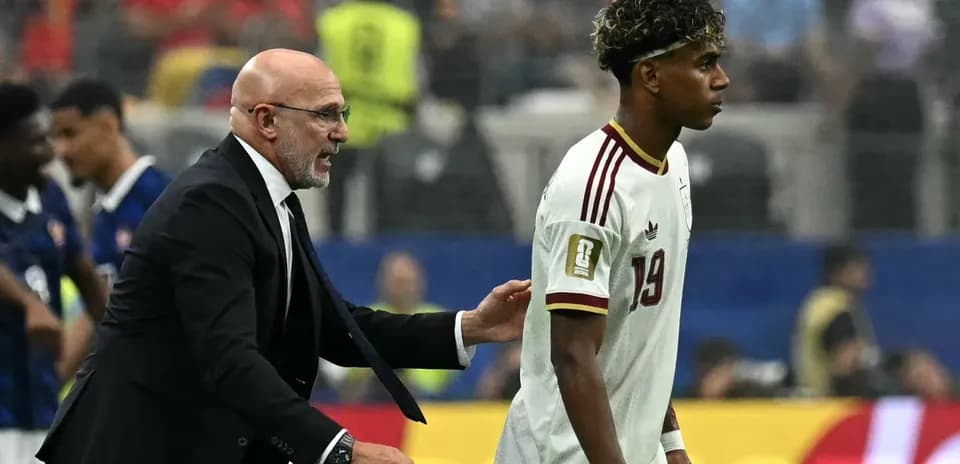 Coach interacting with player during a match