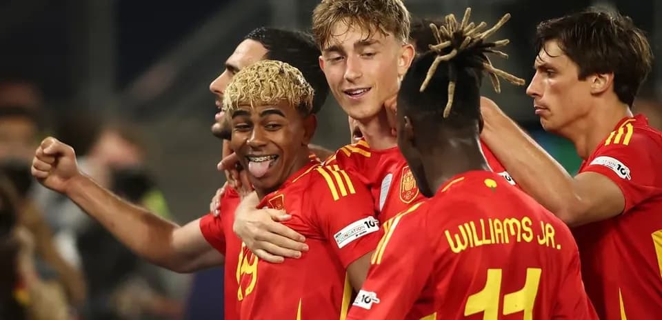 Spanish players celebrating a goal during match