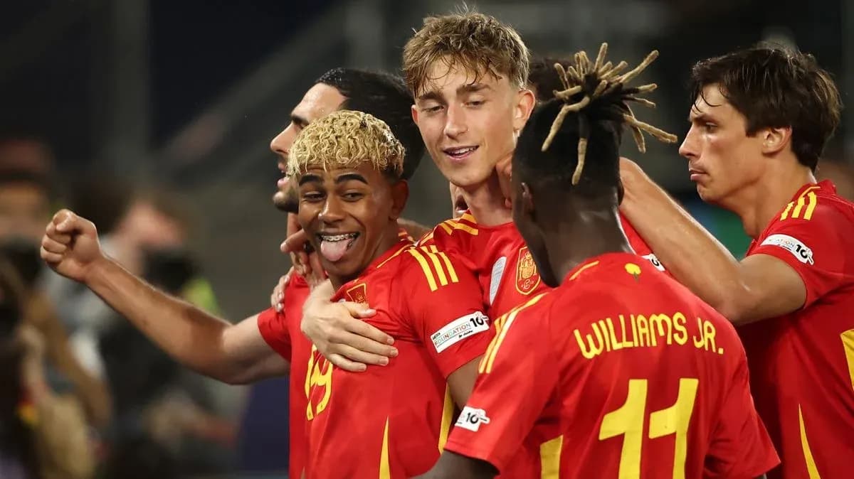 Spanish players celebrating a goal during match