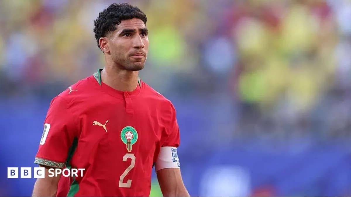 Moroccan player wearing red jersey on the field