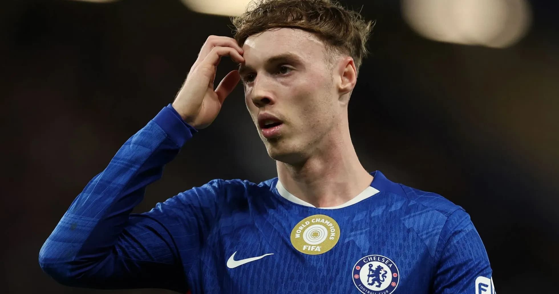 Chelsea player looking thoughtful during match