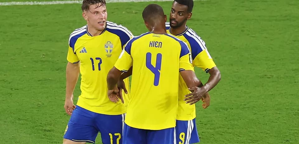 Swedish players celebrating a goal on the field