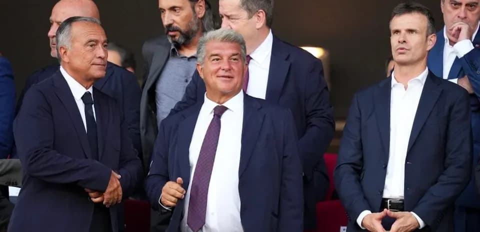 Executives observing match from VIP box
