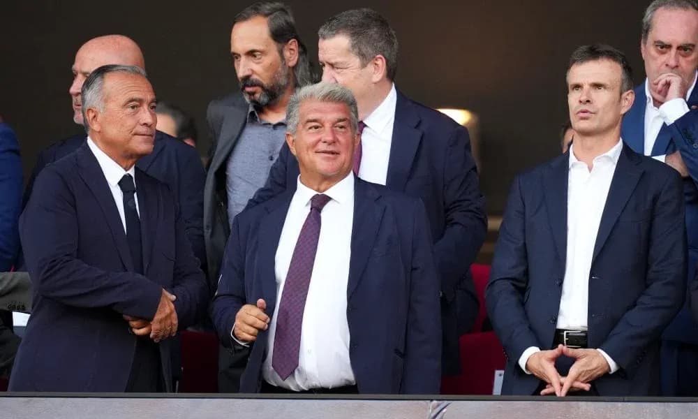 Executives observing match from VIP box