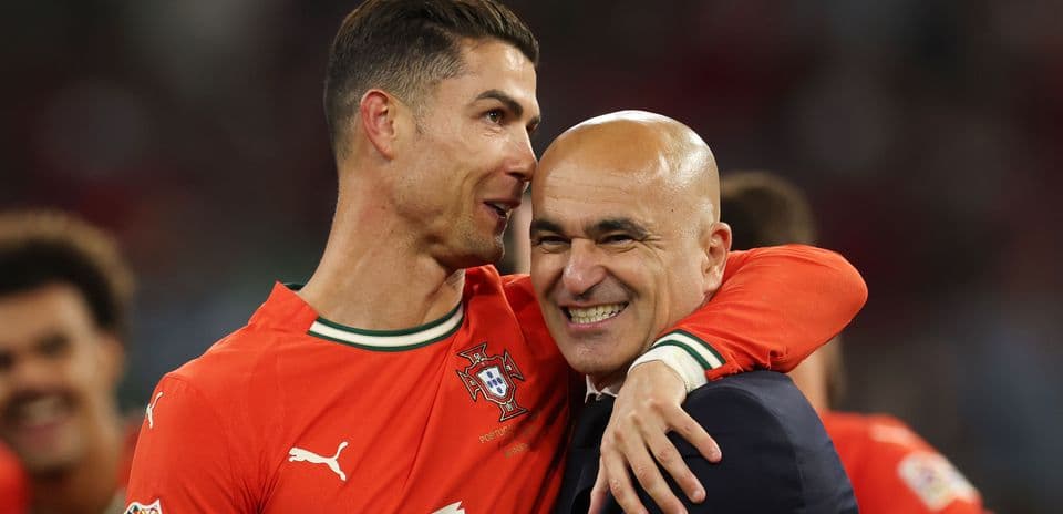 Cristiano Ronaldo and coach celebrating together