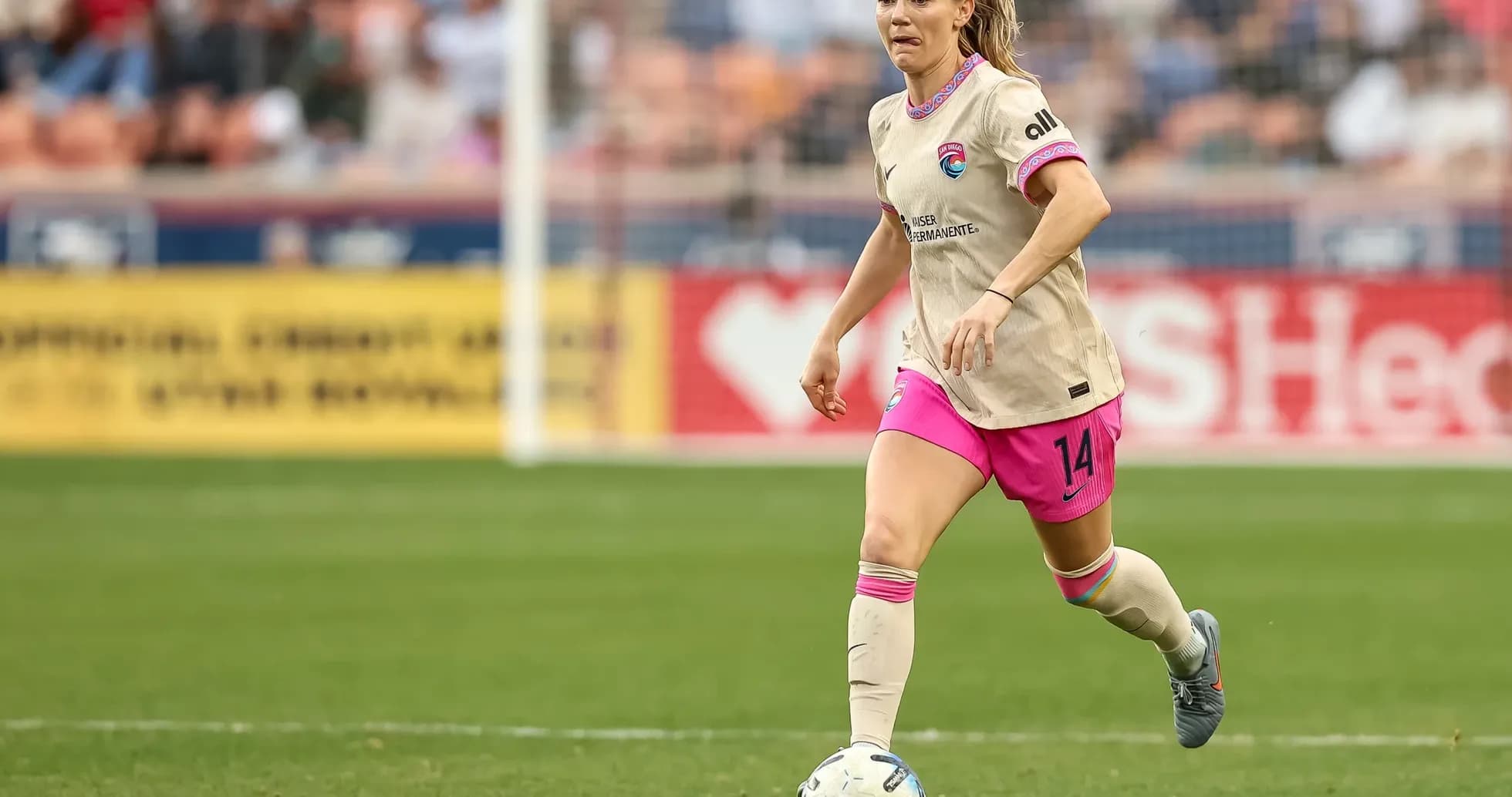 Player dribbling the ball during NWSL match