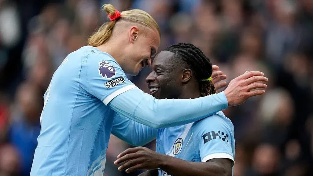 Manchester City players celebrating a goal