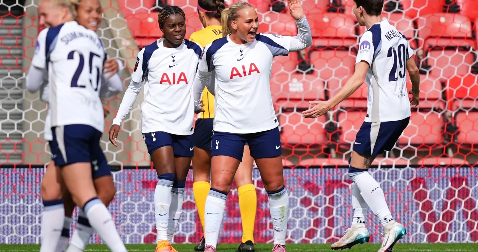 Tottenham Hotspur W players celebrating a goal