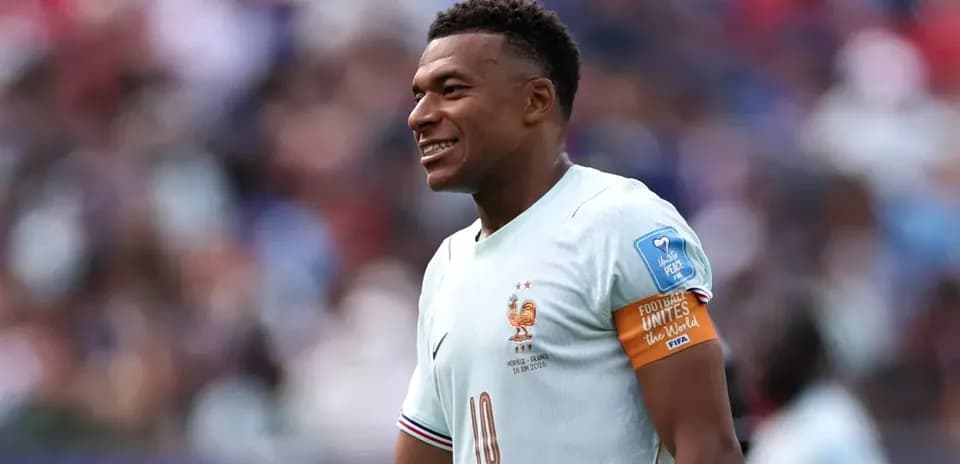Player in France kit smiling during match