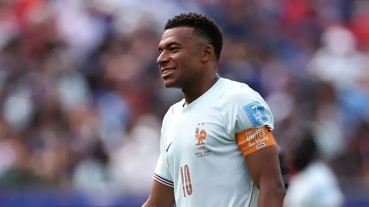 Player in France kit smiling during match