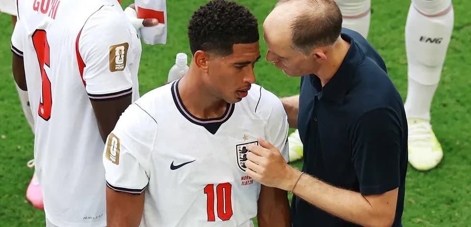 Player receiving guidance from coach during match