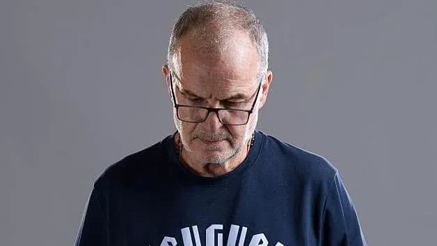 Person looking down while wearing glasses