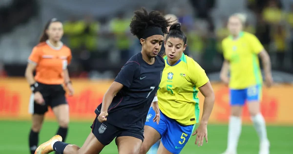 US and Brazil players competing for the ball