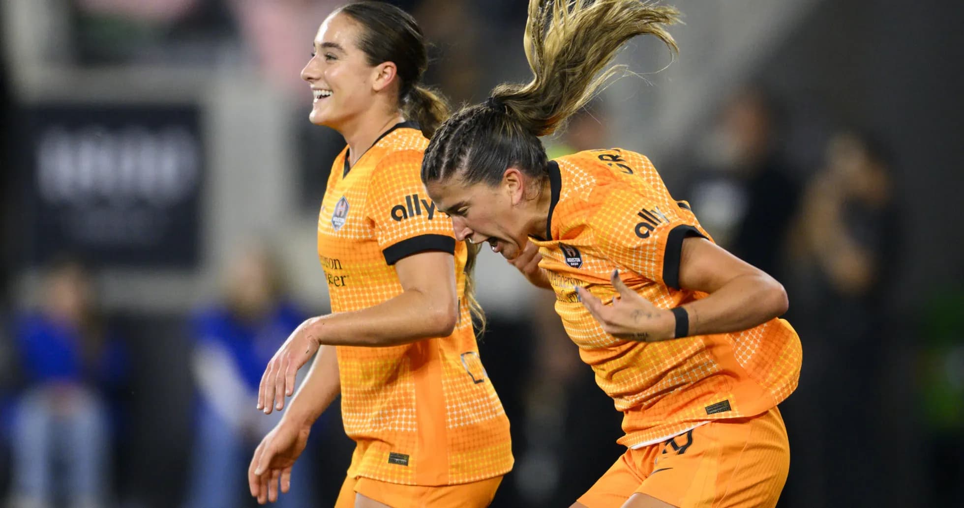 Houston Dash players celebrating a goal