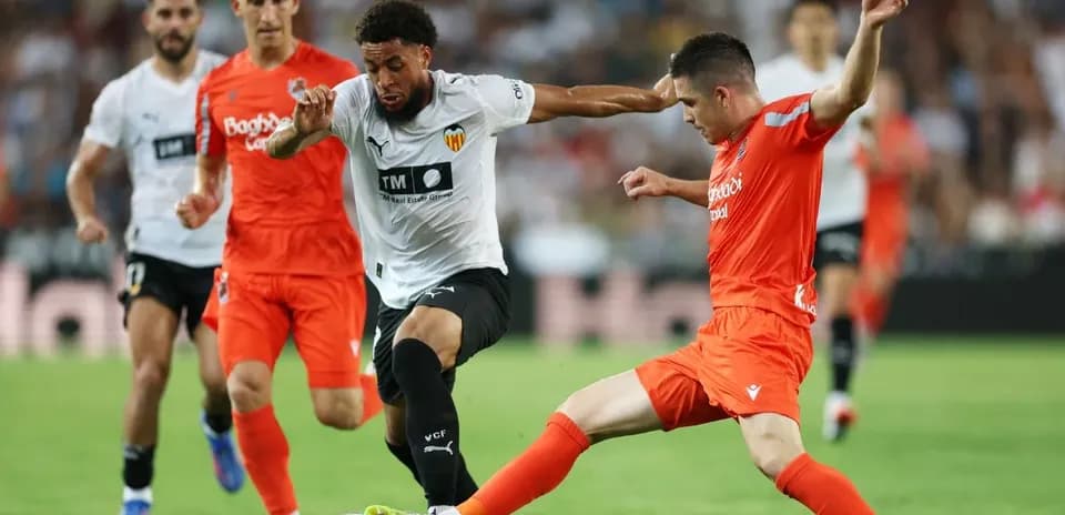 Players competing during Real Sociedad vs Valencia match