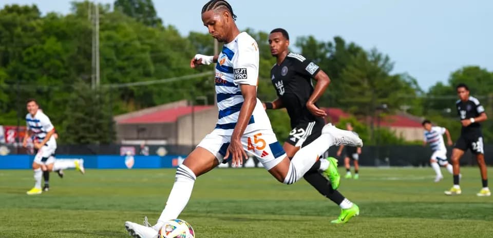 Player from Huntsville City taking a shot