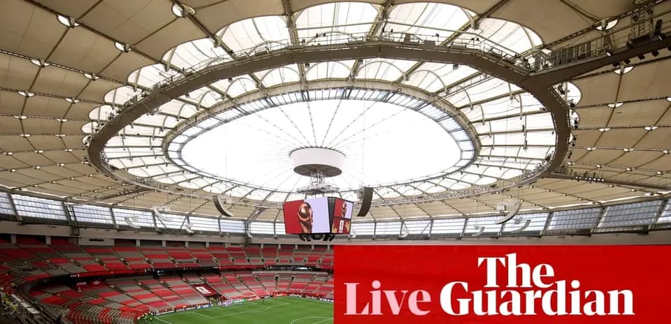 Interior view of a large sports stadium with roof