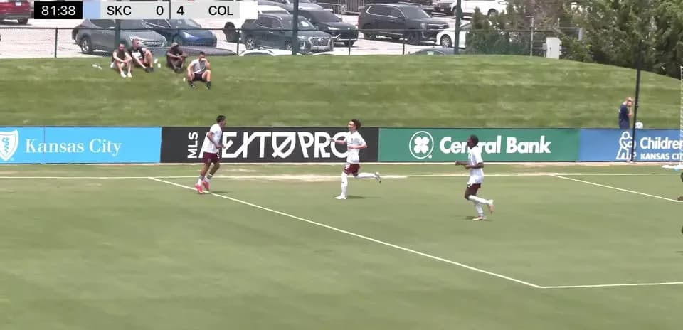 Players celebrating a goal during match