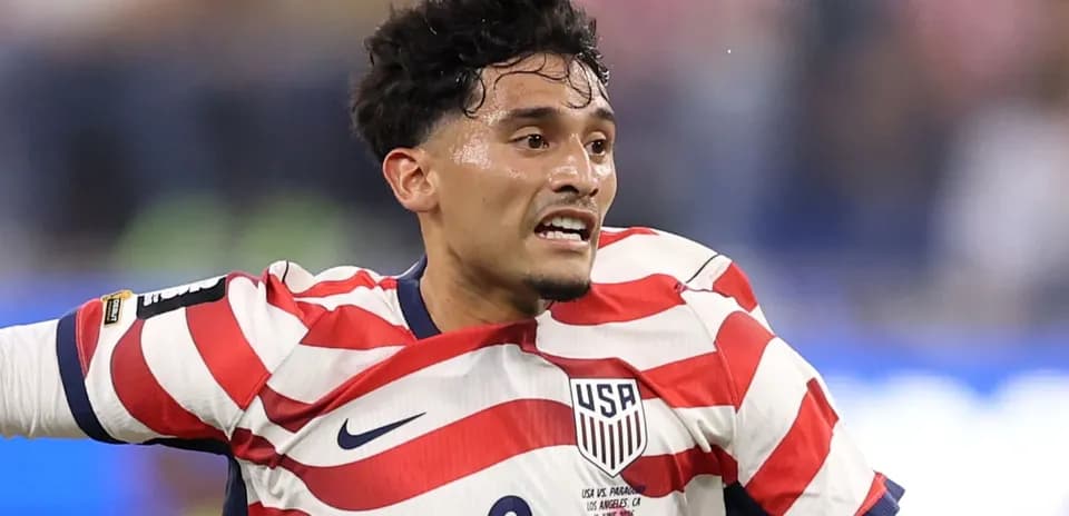 Player in USA kit celebrating during a match
