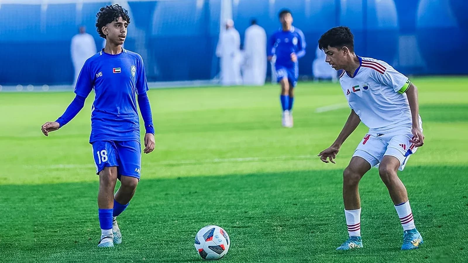 Players from Ittihad Kalba and Al Nasr during match