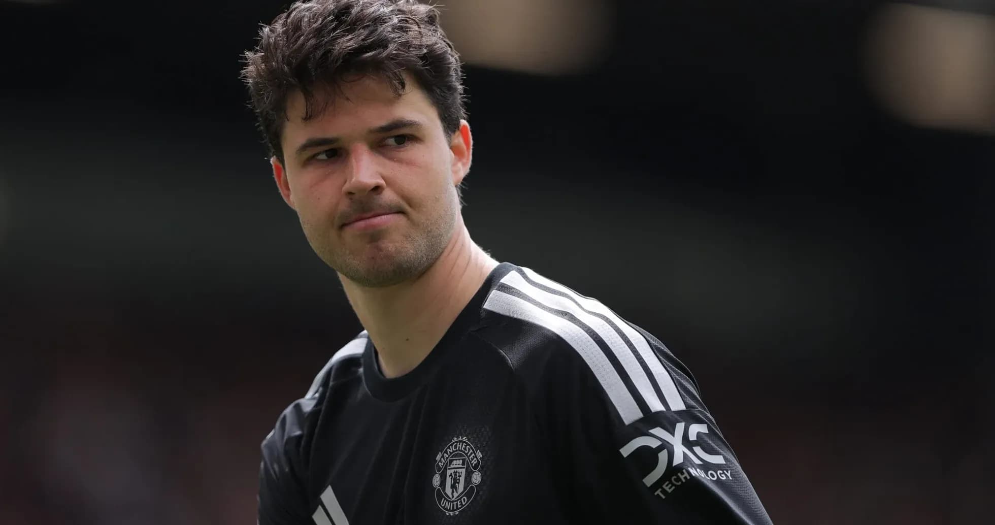 Goalkeeper in Manchester United kit during match