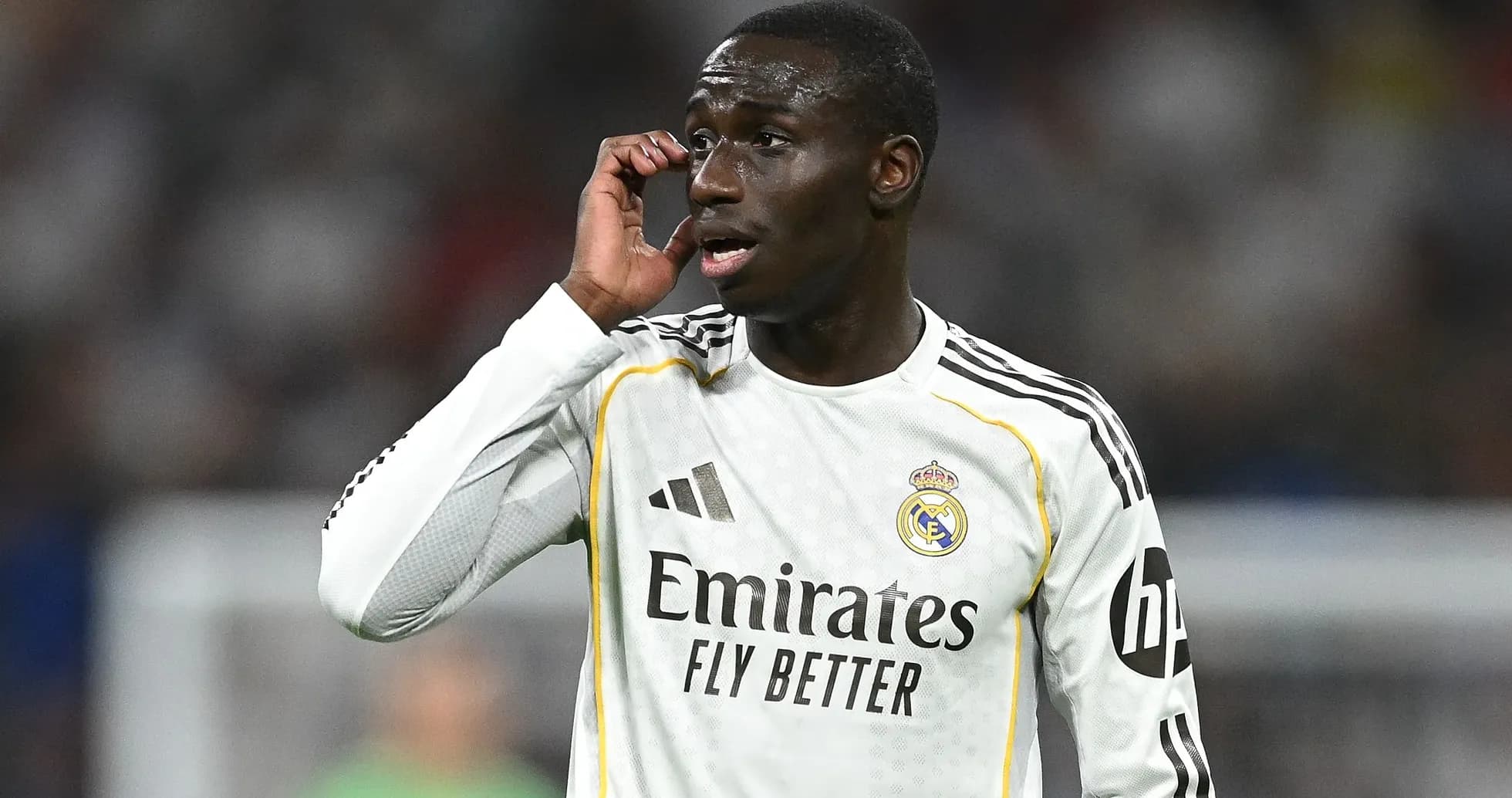 Player in Real Madrid jersey during match action