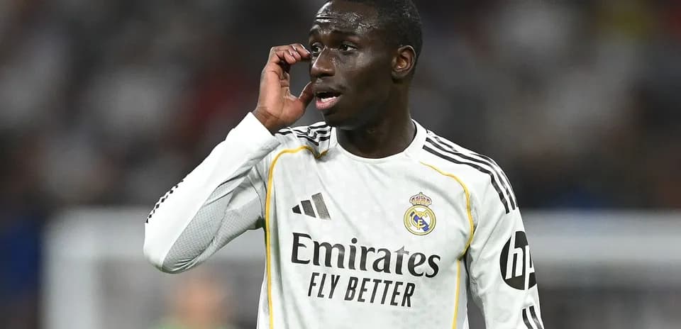 Player in Real Madrid jersey during match action