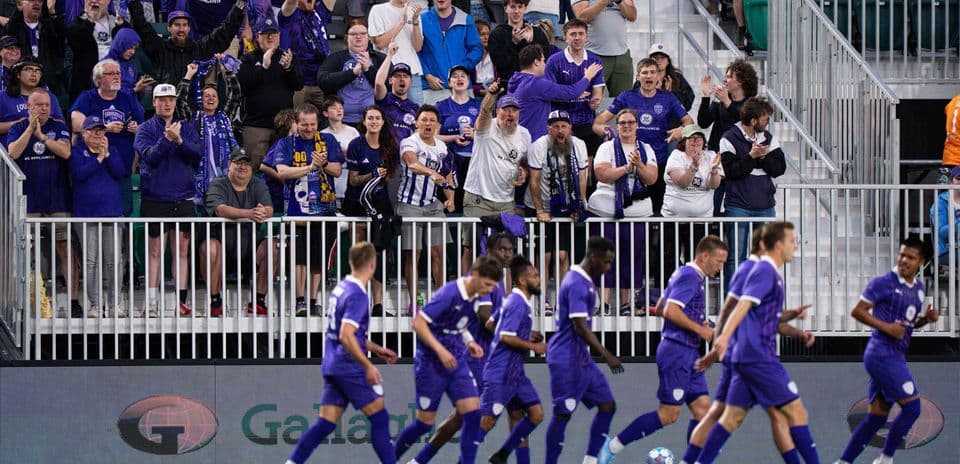 Louisville City fans celebrating during match
