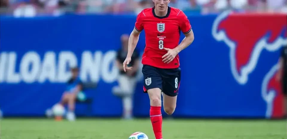 Player running with ball during soccer match