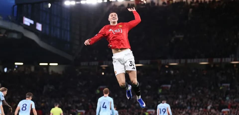 Player celebrating a goal during match at Old Trafford