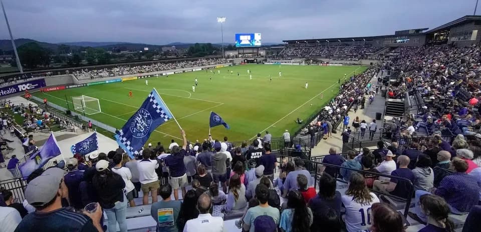 Huntsville City FC fans cheering at the match