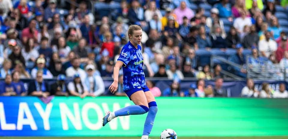 Player from Seattle Reign FC in action